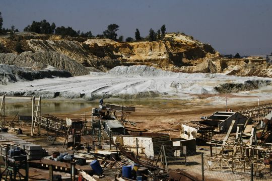 An iconic mine dump in Johannesburg being reprocessed to extract the gold remaining in the waste.