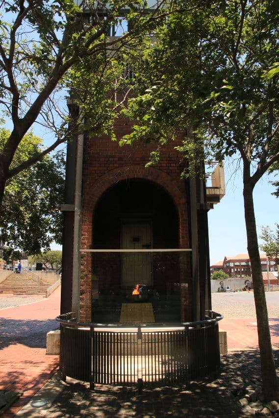The Eternal Flame of Democracy burns inside the staircase of the Awaiting Trial Block - directly opposite the entrance to the Constitutional Court, at Constitution Hill in Johannesburg. The Eternal Flame of Democracy burns inside the staircase of the Awaiting Trial Block - directly opposite the entrance to the Constitutional Court, at Constitution Hill in Johannesburg.